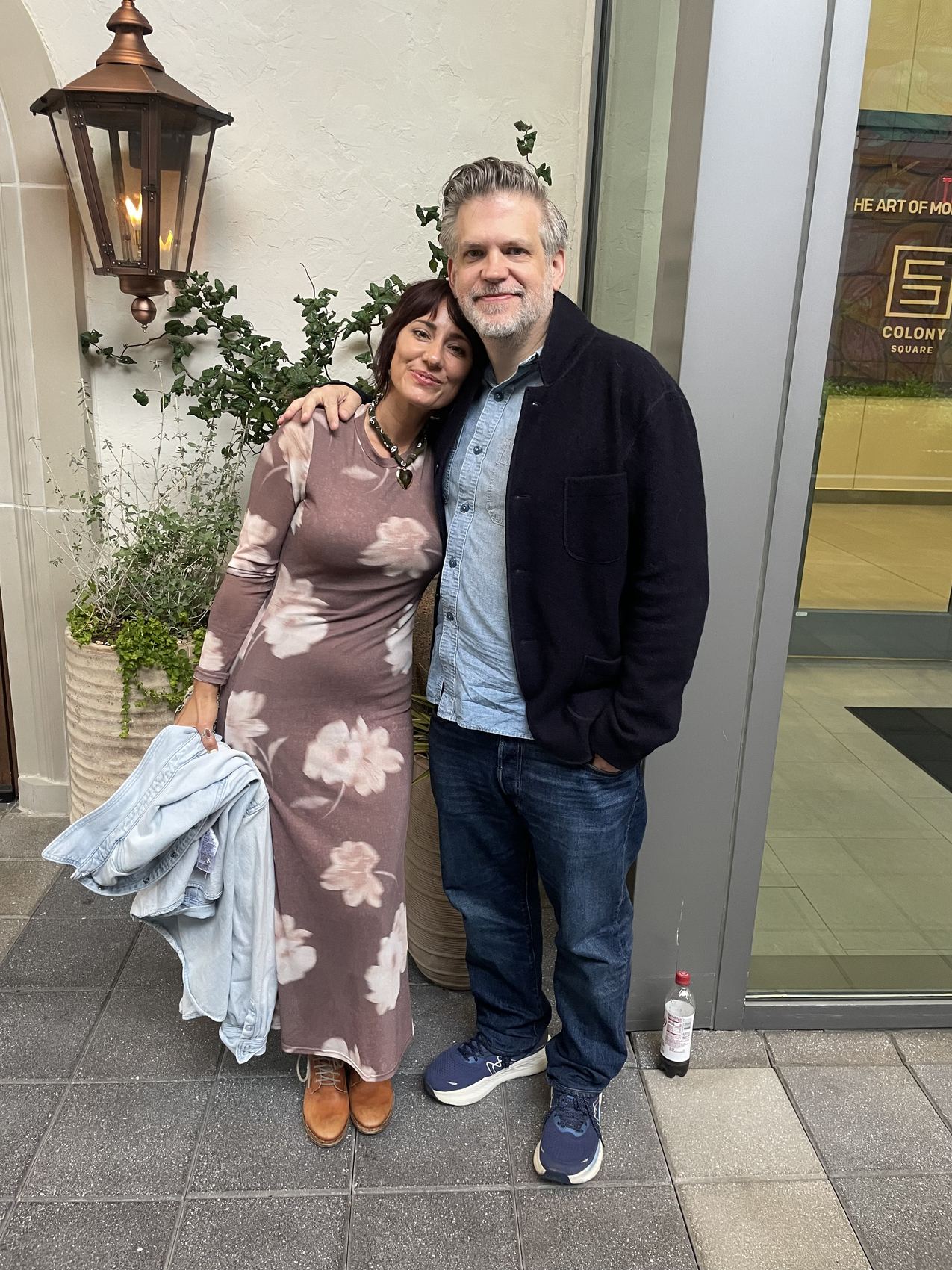 Danielle and Patrick dressed up together outside in the evening